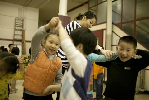 Children dancing in a NYC school