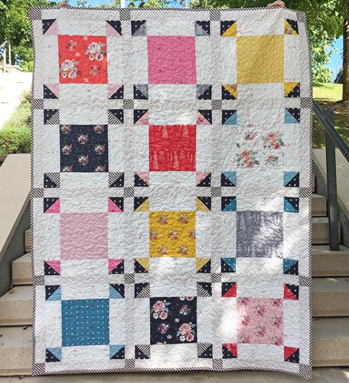 Melanie Call  Love how Melanie used the Idyllic collection by Minki Kim in this quilt design! (Ps. Those fabrics are in our newest download of Stash!) See more pictures of this quilt, and others on Melanie's Instagram, @abitofscrapstuff.
