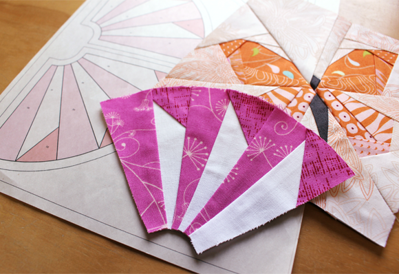 Print paper-piecing patterns onto a sheet, then sew directly over it.