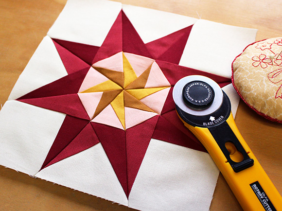 Print paper-piecing patterns onto a sheet, then sew directly over it.