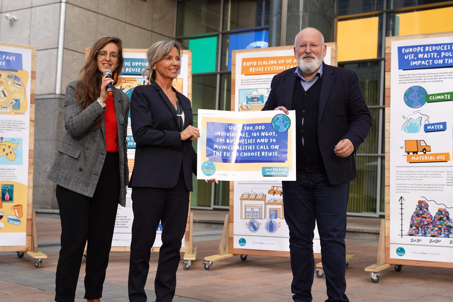 A photo of BFFP European Coordinator Delphine Lévi Alvarès at the #WeChooseReuse signature handover with European Commission Vice President Frans Timmermans and Member of European Parlament Fréderique Ries.