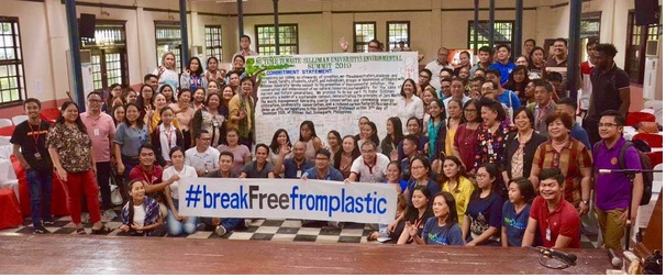 Students and Faculty at Silliman University holding a #breakfreefromplastic banner